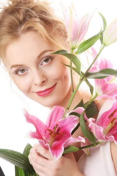 Young woman with pink lily close up picture — Stock Photo, Image