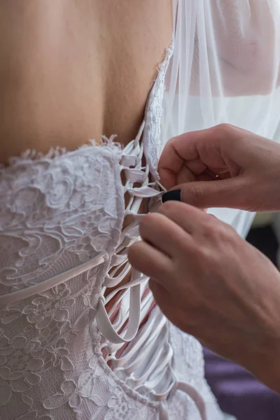 Garter on the leg of a bride, Wedding day moments