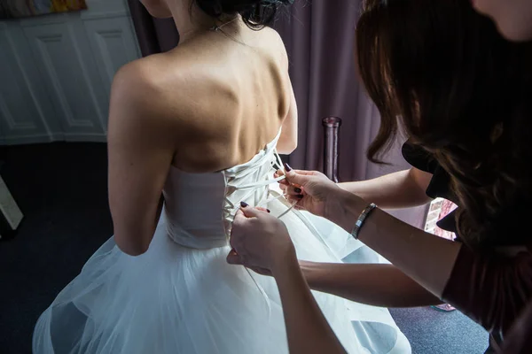 Garter on the leg of a bride, Wedding day moments