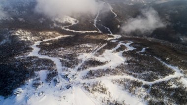 Gorny Vozdukh ski resort. Gorny Vozdukh or Mountain Air is a large winter sports center on the Russian island of Sakhalin. clipart