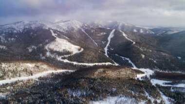 Gorny Vozdukh ski resort. Gorny Vozdukh or Mountain Air is a large winter sports center on the Russian island of Sakhalin. clipart