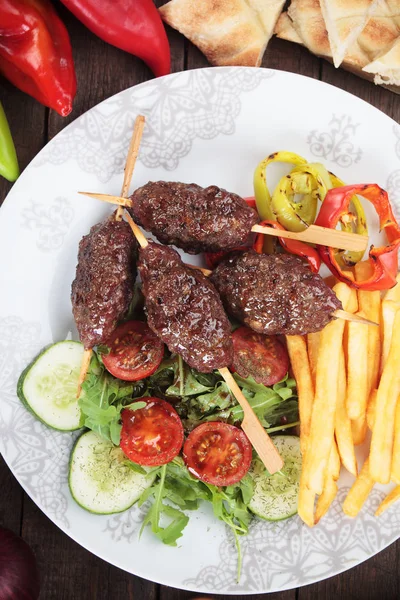 Kofta kebab with french fries — Stock Photo, Image