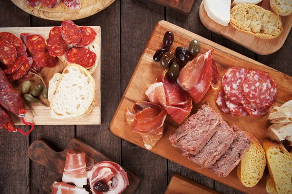 Charcuterie board with cured meats — Stock Photo, Image