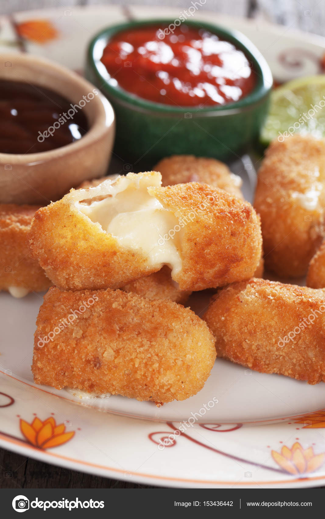 Breaded mozzarella cheese sticks — Stock Photo © igordutina 153436442
