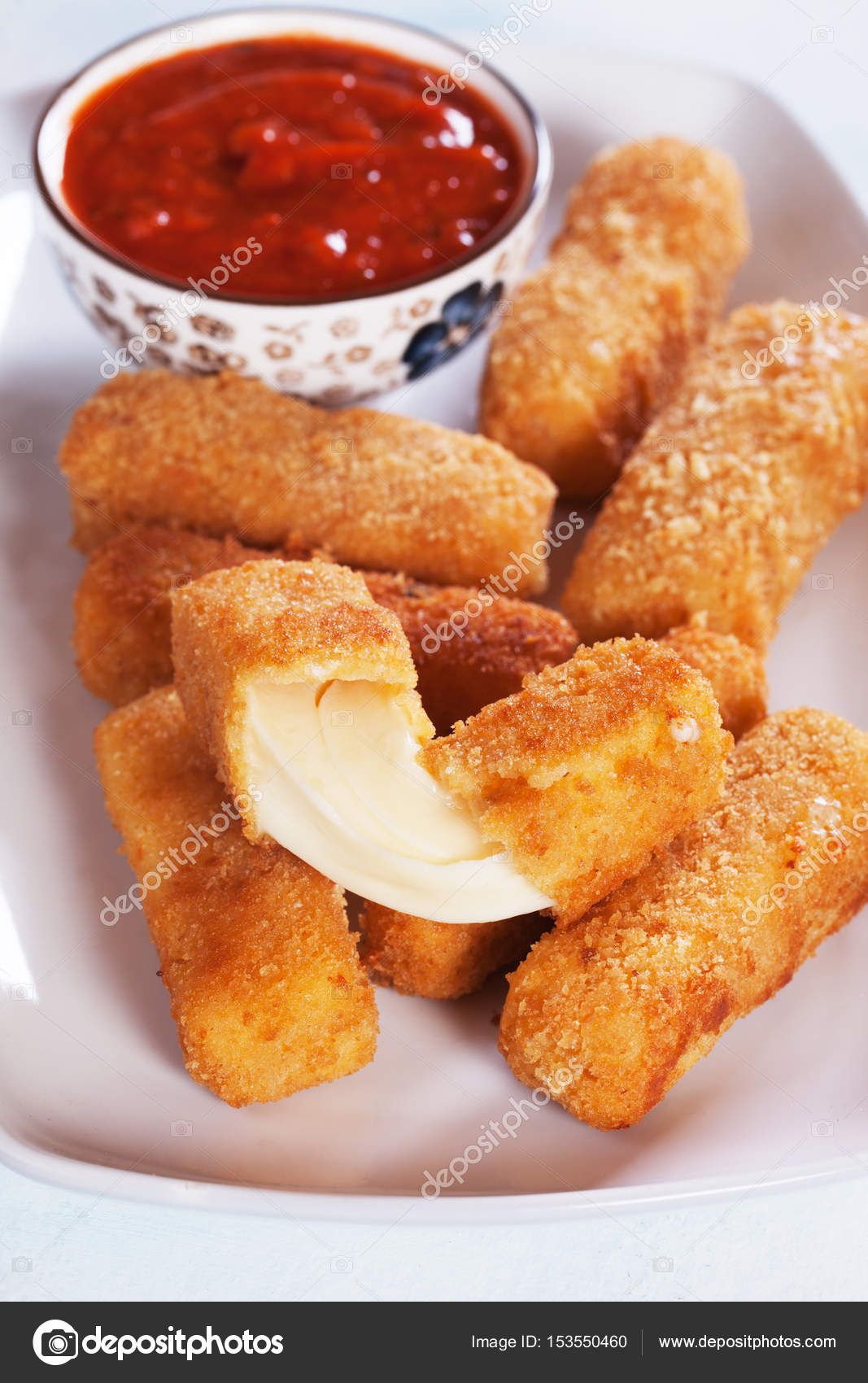 Breaded mozzarella cheese sticks — Stock Photo © igordutina 153550460