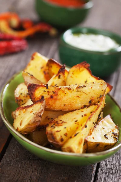 Spicy roasted potato wedges — Stock Photo, Image