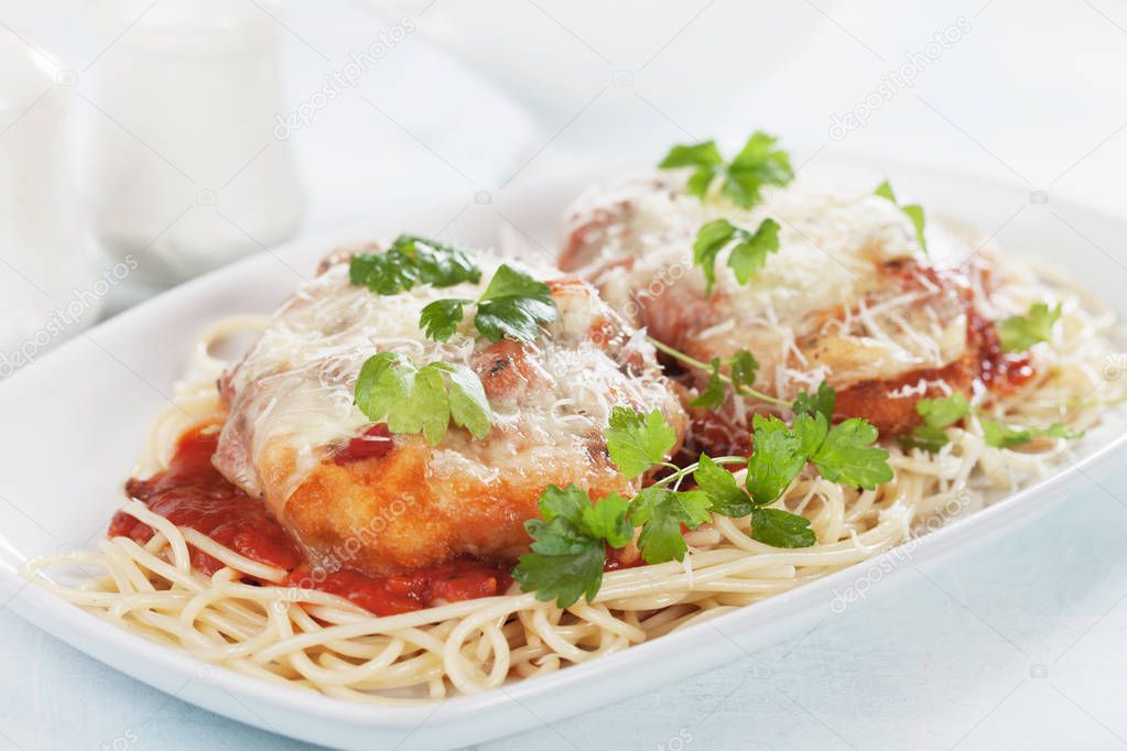 Italian parmesan chicken with spaghetti pasta