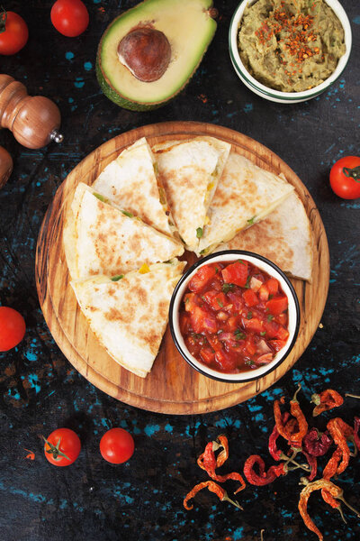 Mexican quesadillas with salsa and guacamole