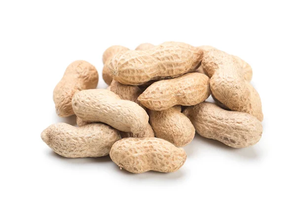 Roasted peanuts isolated on white — Stock Photo, Image