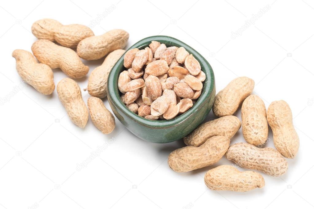 Roasted peanuts isolated on white