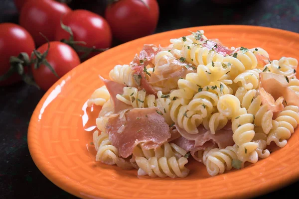 Italian pasta with prosciutto — Stock Photo, Image