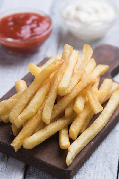 French fries with ketchup and mayonnaise — Stock Photo, Image