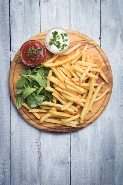 French fries with ketchup and mayonnaise — Stock Photo, Image