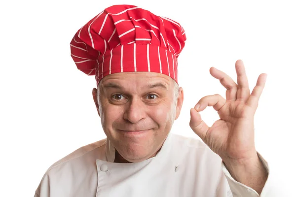 Chef met rode hoed die uitdrukkingen maakt — Stockfoto