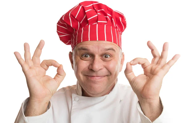 Chef with red hat making expressions — Stock Photo, Image