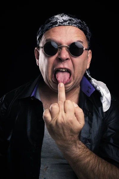 Rock star making facial expressions — Stock Photo, Image