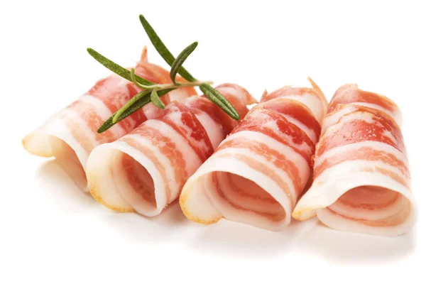 Rolls of pancetta bacon isolated on white — Stock Photo, Image