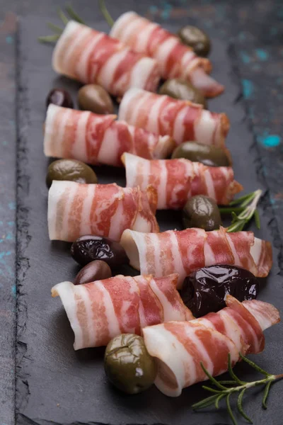 Rolls of pancetta bacom — Stock Photo, Image