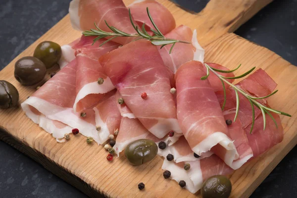 Slices of cured prosciutto ham — 스톡 사진