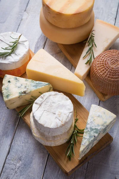 Aged cheese round and slices — Stock Photo, Image