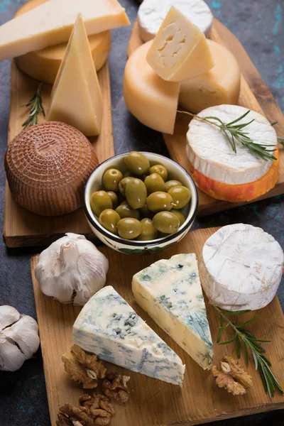 Aged cheese round and slices — Stock Photo, Image