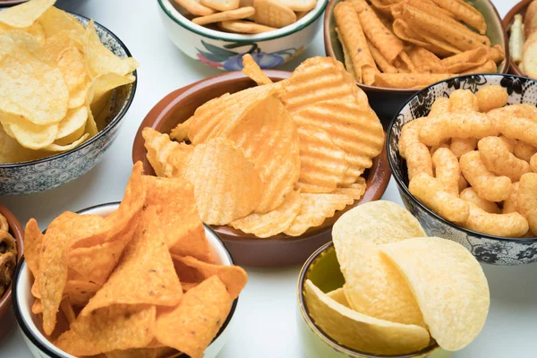 Salty snacks served as party food — 스톡 사진