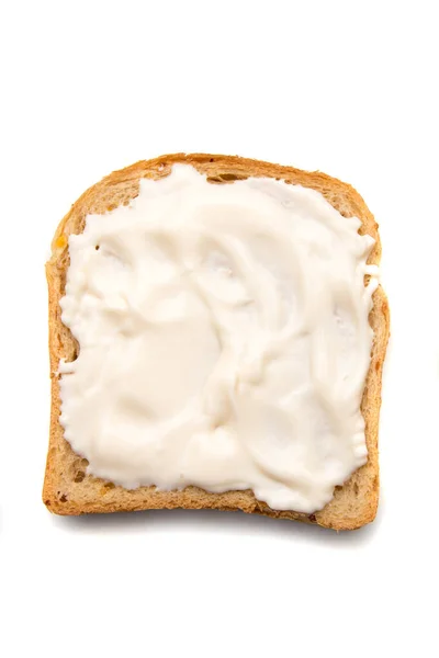 Felie de pâine cu răspândire pe partea de sus — Fotografie, imagine de stoc