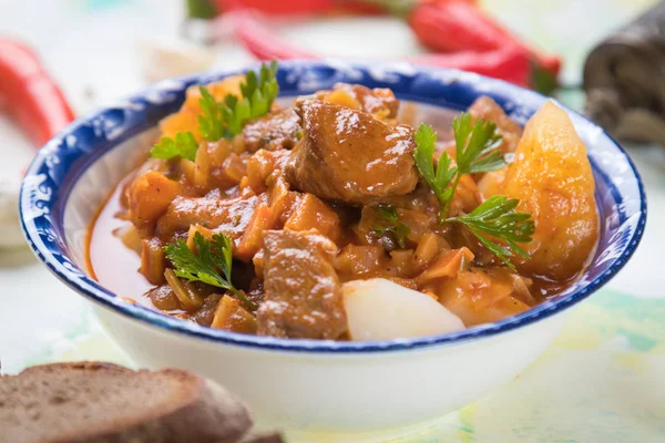 Beef goulash served in bowl — Stock Photo, Image