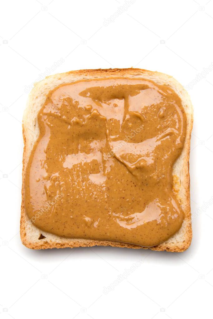 Slice of bread with peanut butter spread on top