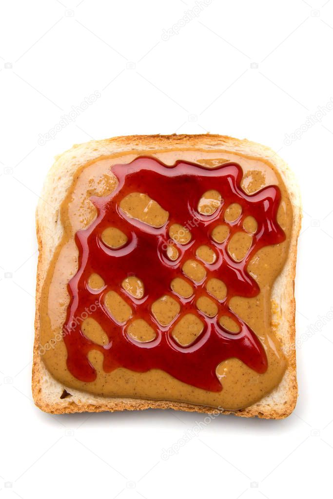 Slice of bread with peant butter and jelly spread on top