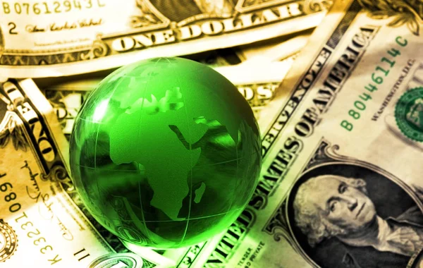Globe dolarů svět — Stock fotografie