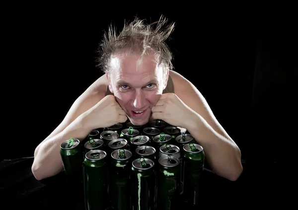 The happy tipsy man near empty beer jars — Stock Photo, Image