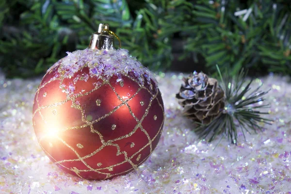 New Year's ball on a background of snow — Stock Photo, Image