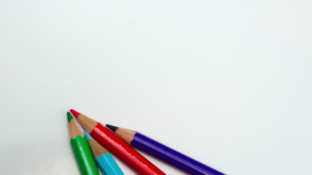 Color pencils spread around, stop-motion — Stock Video