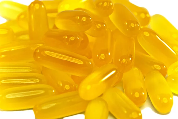 Κίτρινο υγρό φάρμακο κάψουλες — Φωτογραφία Αρχείου