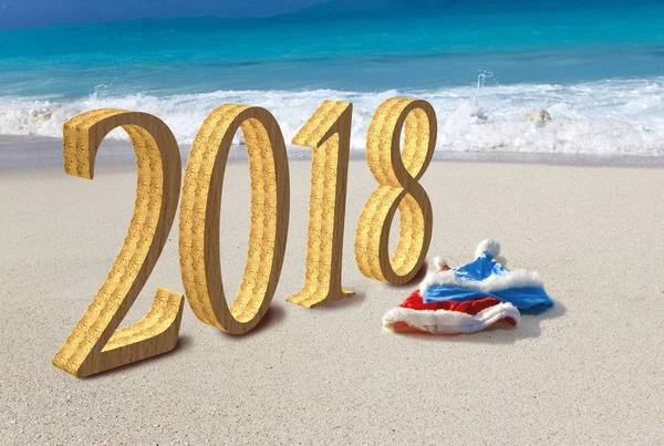 Happy new year card. Two New Year\'s caps of Santa Claus on beach and inscription 2018 in the sand