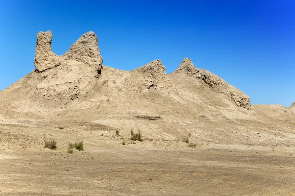 Ruins of the ancient fortresses of Khorezm in the desert. Uzbekistan — Stock Image Ruins Ancient Fortresses Khorezm Desert Uzbekistan Royalty Free Stock Images