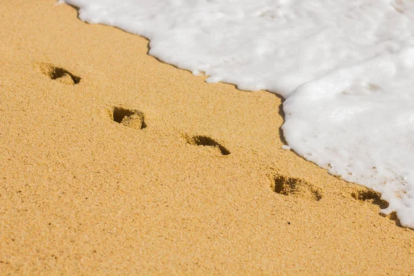 Αποτύπωμα ποδιού στην παραλία της άμμου — Φωτογραφία Αρχείου