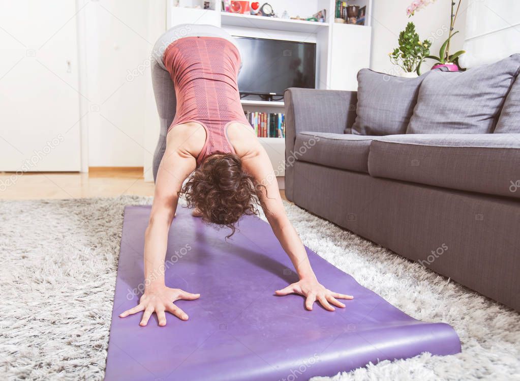 Woman Practicing Yoga 