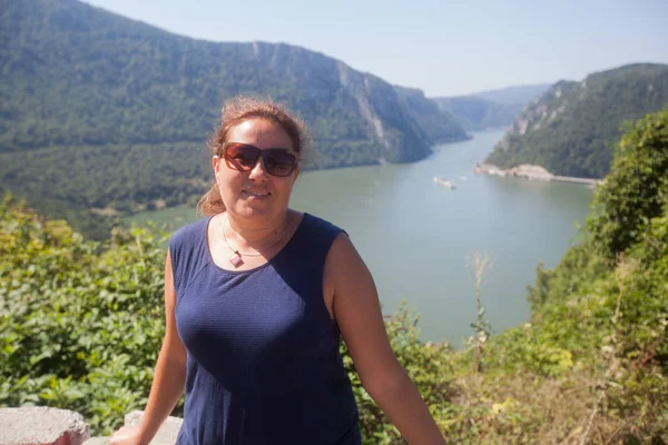 Woman enjoys the view on the Danube river — Stock Photo, Image