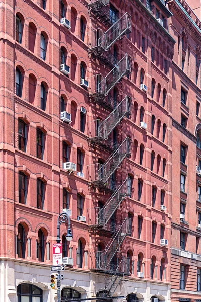 Typical old houses with facade stairs in Tribeca, NYC, USA — Stock Photo, Image