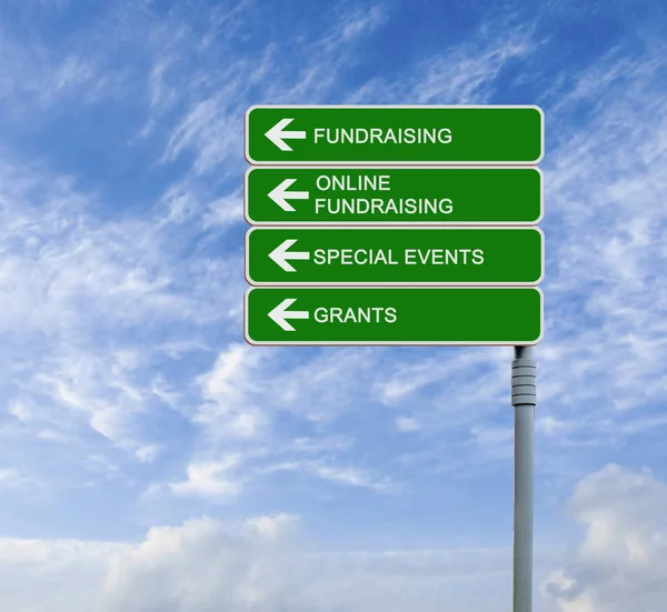 Road sign to fundraising — Stock Photo, Image