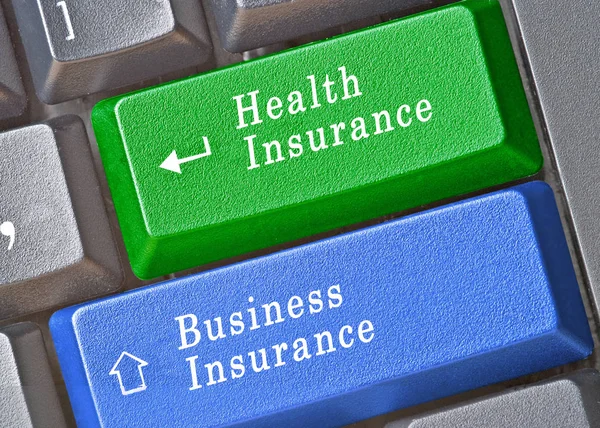 Keys for business and health insurance — Stock Photo, Image