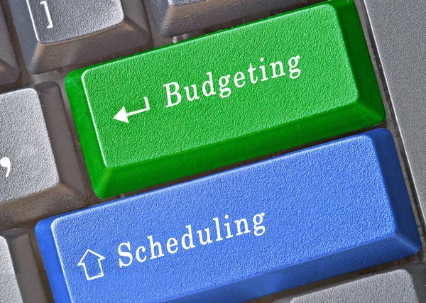 Tangentbord med tangenter för schema och budget — Stockfoto