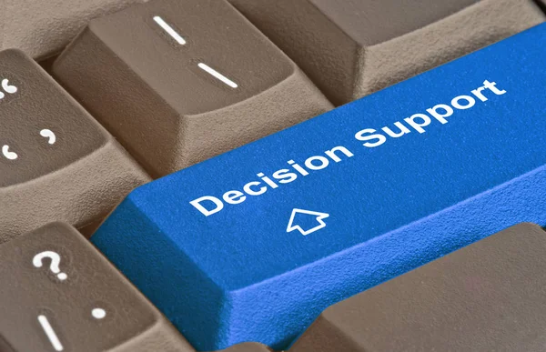 Toetsenbord met sleutel voor ondersteuning van de besluitvorming — Stockfoto