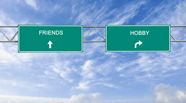 Road signs to friends and hobby — Stock Photo, Image