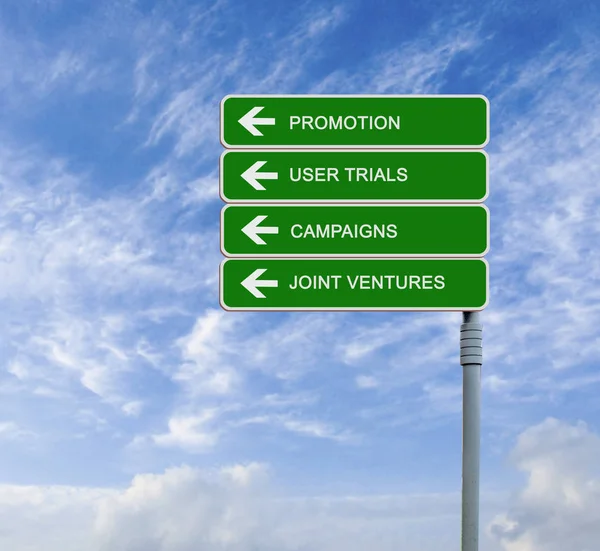 Road signs to promotion — Stock Photo, Image