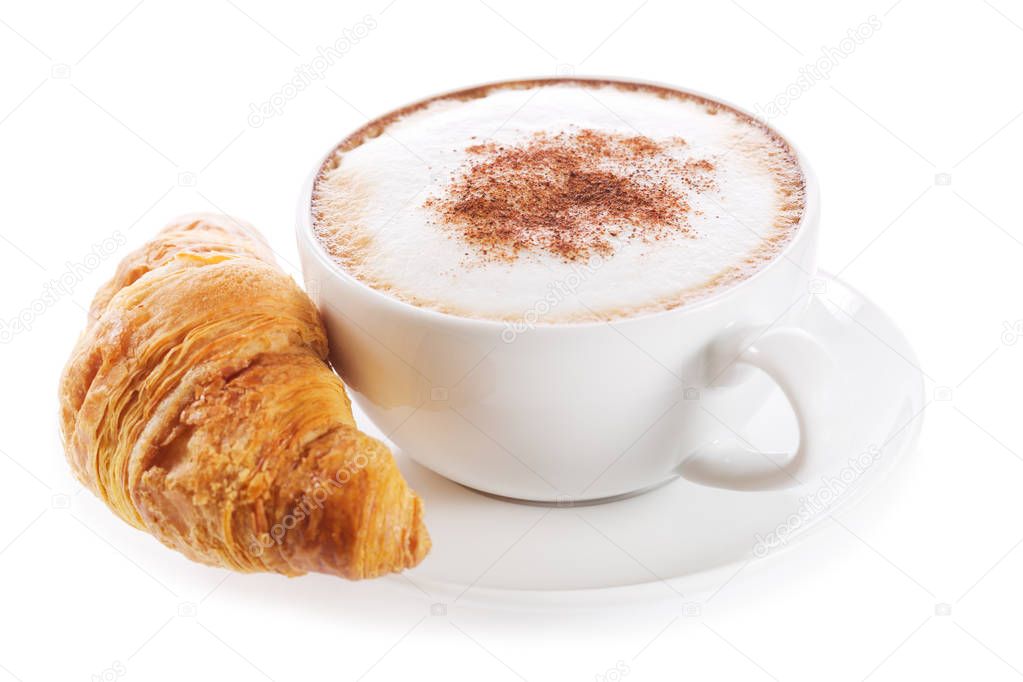 Tazza di caffè cappuccino e cornetto su priorità bassa ...