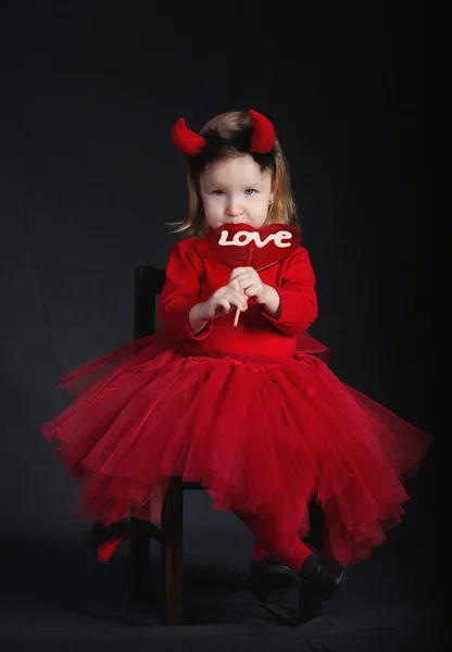 Funny little devil on dark background — Stock Photo, Image