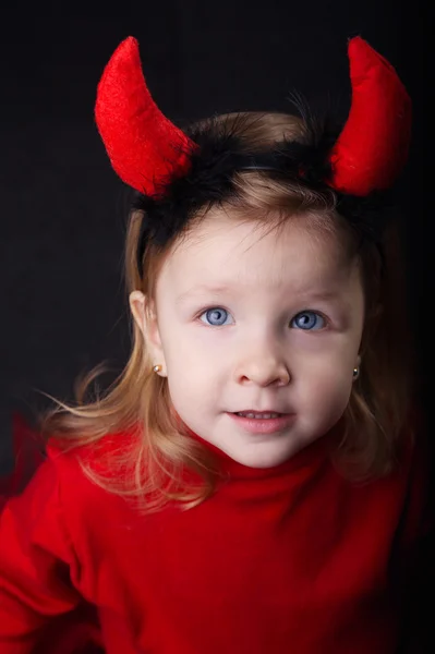 Little devil on dark background — Stock Photo, Image